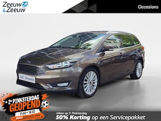 Ford Focus Wagon 1.0 Titanium | DEALERONDERHOUDEN | 12 MAANDEN GARANTIE | PARKEERSENSOREN | AIRCO | NAVIGATIE