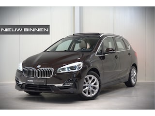 BMW 2-serie Tourer 218i High Executive Luxury Line | Panoramadak | Stoelverwarming | Head-Up Display | Parkeersensoren | Navigatie | Trekhaak | Cruise Control | Climate Control | NAP