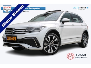 Volkswagen Tiguan 1.4 TSI eHybrid R-Line Business | Incl. 12 maanden garantie | Adaptieve cruise control | Apple carplay/Android auto | Uitklapbare trekhaak | 360° camera | Stoel verwarming voor + achter | Memory seats | Stuurverwarming |