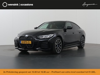 BMW i4 eDrive35 High Executive 70 kWh | M-Pakket | SOH 96% | HUD | Sportstoelen elektrisch verstelbaar + Geheugen | Camera | DAB | Apple CarPlay/Android Auto | Adaptieve Cruise Control | Ele. kofferdeksel |