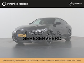 BMW i4 eDrive35 High Executive 70 kWh | M-Pakket | SOH 96% | HUD | Sportstoelen elektrisch verstelbaar + Geheugen | Camera | DAB | Apple CarPlay/Android Auto | Adaptieve Cruise Control | Ele. kofferdeksel |