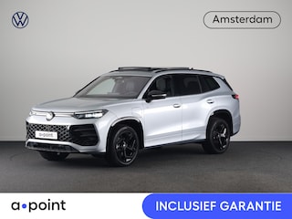 Volkswagen Tayron 1.5 eHybrid R-Line Edition 272 pk Automaat (DSG) | Verlengde garantie | Navigatie | Panoramadak | Trekhaak (wegklapbaar) | Parkeersensoren (Park assist) | Rondomzicht camera | Stoelverwarming v/a | Lederen bekleding |