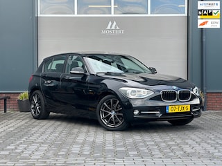 BMW 118i Business+|Automaat|2012|NAP|Dealer|Trekhaak|Cruise|Sport pakket|Navi|PDC|17" LMV