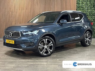 Volvo XC40 T5 Recharge Inscription | Trekhaak | Harman Kardon | Adaptieve Cruise Control | Bestuurdersstoel elektrisch geheugen | Standkachel met Volvo On Call App | Stoel en Stuurwielverwarming | Full LED meesturende koplampen | Pilot Assist | BLIS Dode Hoek Detectie | Parkeercamera | Lederen bekleding | Zitting verlenging voorstoelen | Passagiersstoel elektrisch | 19 Inch | Keyless Drive | Parkeersensoren voor+achter | Elektrisch bedienbare achterklep | Privacy Glass | Breedstralers in voorbumper | Draadloos telefoon opladen | Climate Control L+R | DAB Radio | Apple Carplay/Android Auto | Volvo On Call met mobiele App functie | Denim Blue Metallic |