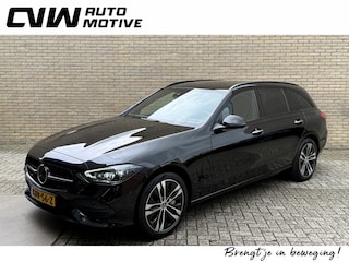 Mercedes-Benz C300e 313pk | Luxury | PHEV | Trekhaak | Half leder | Camera | Sfeerverlichting | PDC | CarPlay | LED | DAB | Lane assist | Dodehoekdetectie | Memory | Stoel&stuurverwarming | Volledig onderhouden