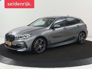 BMW 118i M Sport | Carplay | Sportstoelen | Camera | Half leder | Navigatie | Live Cockpit | Park Assist | Full LED | Climate control | Sfeerverlichting | Cruise control | Bluetooth