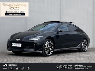 Hyundai Ioniq 6 Lounge AWD 325 pk 77.4 kWh / Fabrieksgarantie tot 5-2029 / tot 05-2032 Batterijgarantie / SoH accu 100 % / Dealer onderhouden / Camera spiegels / Schuifdak / Elektrische stoelen en klep / Leder / Camera 360° / BOSE / Adapt. CC / Stuur-, stoel- & achterbankverwarming / Stoelventilatie / 20" LM wielen /