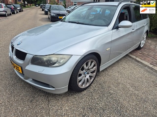 BMW 3-serie Touring 320i High Executive differentieel hoorbaar