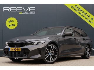 BMW 3-serie Touring 320e | M Sport LCI | Dravitgrau | Leer / Alcantara | Trekhaak afn. | 19 Inch | Stoelverwarming | Live Cockpit Plus | M-Pakket