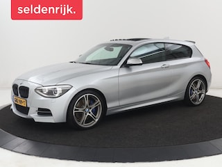 BMW M135i xDrive High Executive | Schuifdak | Leder | Stoelverwarming | Memory | Bi-Xenon | Parkeerhulp | Climate control | Sportstoelen | Bluetooth | Cruise control | M Sport