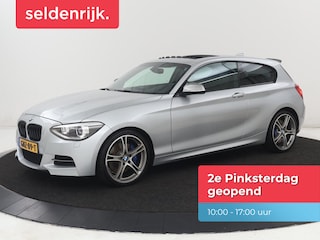 BMW M135i xDrive High Executive | Schuifdak | Leder | Stoelverwarming | Memory | Bi-Xenon | Parkeerhulp | Climate control | Sportstoelen | Bluetooth | Cruise control | M Sport