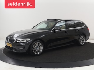 BMW 330i High Executive | Panoramadak | Sport Line | Leder | Stoelverwarming | Trekhaak | Carplay | Live Cockpit | Camera | Navigatie | Sfeerverlichting | Park Assist | Sportstoelen | Climate control