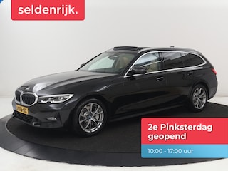BMW 330i High Executive | Panoramadak | Sport Line | Leder | Stoelverwarming | Trekhaak | Carplay | Live Cockpit | Camera | Navigatie | Sfeerverlichting | Park Assist | Sportstoelen | Climate control