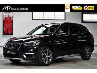 BMW X1 sDrive20i Orange Edition II | X-Line | Panoramadak | Head-Up | 18 inch | NL auto | 2e eigenaar |