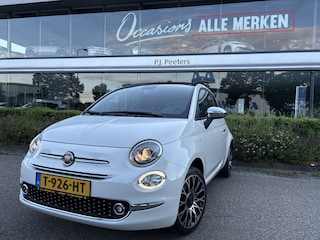Fiat 500 1.0 Hybrid Dolcevita Cabrio Airco - Open dak - Navigatiesysteem - parkeersensoren achter - Cruise control - Licht metalen velgen 16 inch - Led verlichting - Bluetooth - Extra getint glas achter - Stuur multifunctioneel Start/stop systeem - Elektrische vouwdak - Elektrische ramen voor - Centrale vergrendeling
