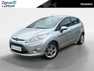 Ford Fiesta 1.25 Champion | Parkeersensoren | Voorruitverwarming | Climate control | Cruise Control | 12 maanden garantie! |