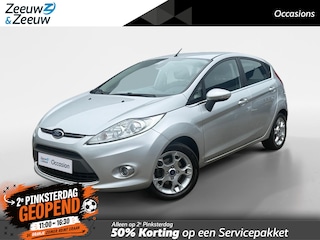 Ford Fiesta 1.25 Champion | Parkeersensoren | Voorruitverwarming | Climate control | Cruise Control | 12 maanden garantie! |