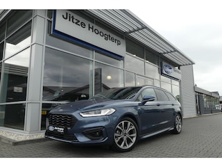 Ford Mondeo Wagon 2.0 IVCT HEV ST-Line WINTER PACK, MEMORY, ADAPT. CRUISE, CLIMA, NAVI, CAMERA, PDC V&A, APPLE CARPLAY/ANDROID AUTO, BLIS, KEYLESS, ELEKT. ACHTERKLEP, ELEKT. PASSAGIERSSTOEL, 54.035KM