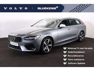 Volvo V90 T4 R-Design Business Sport - IntelliSafe Assist & Surround - Harman Kardon audio - DAB - Keyless - Elektr. verstelbare voorstoelen met geheugen - Apple® CarPlay - Android Auto - Navigatiesysteem - Elektr. bedienbare achterklep - Stoelverwarming voor & achter - Stuurwielverwarming - Standkachel - Parkeersensoren voor & achter - Lederlook dashboard - Cross Traffic Alert - CD speler - 18 inch LMV