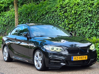 BMW 2-serie Coupé M235i High Executive Schuifdak GR Navi H&K Stuurverwarming NAP