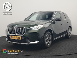 BMW iX1 xDrive30 xLine 67 kWh 306pk Dealer O.H. | Trekhaak Af Fabriek | Camera | Adaptief Onderstel | Lederen Sportstoelen Memory & Verwarmd | Sfeerverlichting | Apple Carplay | Blis | Navigatie | DAB | Virtual | Cruise Control |