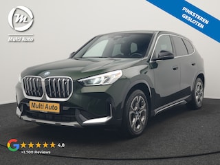 BMW iX1 xDrive30 xLine 67 kWh 306pk Dealer O.H. | Trekhaak Af Fabriek | Camera | Adaptief Onderstel | Lederen Sportstoelen Memory & Verwarmd | Sfeerverlichting | Apple Carplay | Blis | Navigatie | DAB | Virtual | Cruise Control |