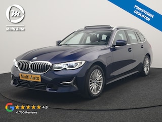 BMW 3-serie Touring 330e Luxury Line PHEV 293pk Dealer O.H. | Trekhaak Af Fabriek | Panodak | Head Up | Adaptive Cruise | Laser LED | Camera | Lederen Comfortstoelen Verwarmd | Sfeerverlichting | Keyless | Blis | Apple Carplay | Navigatie | DAB | Plug In Hybrid |