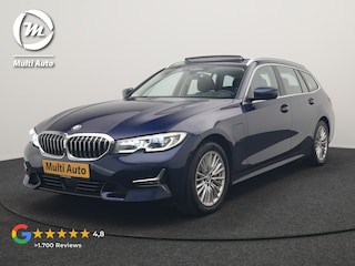 BMW 3-serie Touring 330e Luxury Line PHEV 293pk Dealer O.H. | Trekhaak Af Fabriek | Panodak | Head Up | Adaptive Cruise | Laser LED | Camera | Lederen Comfortstoelen Verwarmd | Sfeerverlichting | Keyless | Blis | Apple Carplay | Navigatie | DAB | Plug In Hybrid |