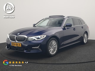 BMW 3-serie Touring 330e Luxury Line PHEV 293pk Dealer O.H. | Trekhaak Af Fabriek | Panodak | Head Up | Adaptive Cruise | Laser LED | Camera | Lederen Comfortstoelen Verwarmd | Sfeerverlichting | Keyless | Blis | Apple Carplay | Navigatie | DAB | Plug In Hybrid |