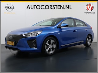 Hyundai Ioniq Premium EV SOH 99,9% Panorama-Schuifdak Adap.Cruise Leder+Memory Navi Ecc Trekhaak Infinity®-Audio Camera Apple Carplay Android Auto Pdc Stoel+Stuurverwarming Elek.Stoelen Lmv Bluetooth Dodehoek+Lane Assist VESS Origineel Nederlandse Auto