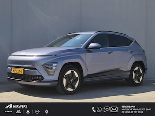Hyundai Kona Comfort Smart 65.4 kWh / SOH 100% / Fabrieksgarantie tot 04-2030 / Stuur- & Stoelverwarming / CCS snelladen / Achteruitrijcamera / Head Up Display  / Adaptief cruise control / Keyless Entry/Start / Apple Carplay Android Auto /