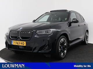 BMW iX3 High Executive 80 kWh M-sport | 1e Eigenaar | Shadow line | Driving Assistant Professional | Wegklapbare Trekhaak | Parking Assistant Plus (360° camera) | Head-Up Display | Harman Kardon Surround Sound |