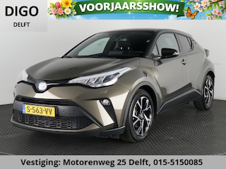 Toyota C-HR 1.8 HYBRID BI-TONE LUXERY LINE GARANTIE 5-2032 TREKHAAK. 4 SEIZOENEN BANDEN.NAVIGATIE. STUUR EN STOELVERWARMING. HALF LEDER