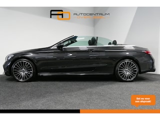 Mercedes-Benz Cabrio 180 AMG Line / C63S AMG Diffuser / Nekverwarming - Airscarf / Panamericana Grille / Stoelverwarming / Apple Carplay - Android Auto / Full LED / Ambienteverlichting / Achteruitrijcamera / Cruise Control / Dodehoekdetectie / 20'' LMV