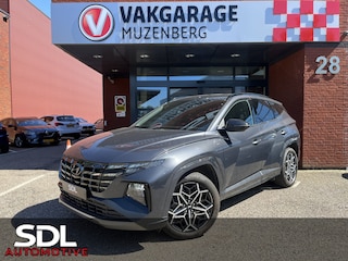 Hyundai Tucson 1.6 T-GDI HEV N Line 4WD // KEYLESS // LEDER-ALCANTARA // CAMERA +SENSOREN // NAVI+CARPLAY // STOELVERWARMING //