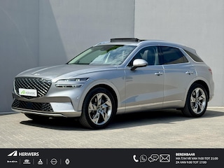 Genesis GV70 AWD SPORT / Fabrieksgarantie tot 06-2029 / SOH 98,7% / 1.800 kg Trekgewicht / Schuif-/Kanteldak / Keyless Entry/Start / Apple Carplay Android Auto / Stuur- Stoel & Achterbank verwarming / Elektische Achterklep / Stoelventilatie / 360/Rondomzicht camera / CCS Snelladen / 20" Velgen /