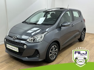 Hyundai i10 Occasion 1.2i | Grijs | Tweedehands Hyundai i10 | Airco | Panoramadak | Automaat | Bluetooth | Stoelverwarming