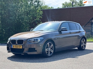 BMW 125i Business+ Automaat*Elektrische schuifdak*Dealer onderhouden*Navigatie*Cruise*Airco*LM velgen*Parkeersensoren*