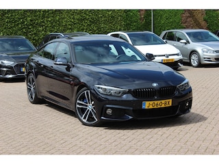 BMW 430i High Exe. M Sport / Schuifdak / Camera / Head-up / Harman Kardon / 19'' / Leder / Navigatie / Dodehoek / DAB / Stoelverwarming / Cruise Control