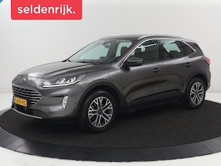 Ford Kuga 2.5 PHEV Titanium | SOH 85,6% | Trekhaak | Stoelverwarming | Camera | Adaptive cruise | Side Assist | Navigatie | Achterbankverwarming | Keyless | Carplay | Plug In