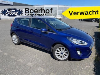 Ford Fiesta Titanium | Voorruitverw. | Clima | Auto-Park | Adap. Cruise | Camera | All season |