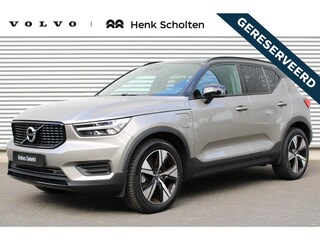 Volvo XC40 T4 Recharge R-Design | Lederen/Stof Bekleding | Electronic Climate Controle | Voorstoelen + Stuurwiel Verwarmend | Achteruitrijcamera Parkeersensor Voor | Cruise Control Adaptief Met Stop&Go En Stuurhulp | Apple Carplay/Android Auto | DAB Ontvanger | Dakrails | Extra Getint Glas |
