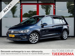 Volkswagen Golf Sportsvan 1.4 TSI Highline | Trekhaak | Camera | Navigatie | Stoelverwarming | Dode Hoek Detectie | Climate Control | Cruise Control | Metallic Lak | All Season Banden | 17'' Lichtmetalen Velgen |