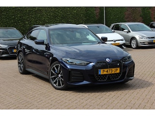 BMW i4 eDrive40 High Exe. M Sportpakket 84 kWh / SOH 91,4% / Trekhaak / Schuifdak / 360Camera / Head-up / Leder / Harman Kardon / Keyless / 19'' / Sfeerverlichting / CarPlay / Stoelventilatie+Verwarming / DAB / ACC