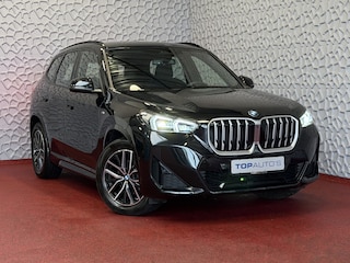 BMW X1 SDRIVE M-SPORT SHADOW LINE NAVI LED ELEK.KLEP CRUISE LEER/ALCANTARA CAMERA M-SPORT INTERIEUR / EXTERIEUR ✅ Top Auto's. Al 30 Jaar uw Bmw Specialist in ,  BMW M / M Sport / PHEV / HEV / Hybrid / Mhev / 25e / 30e / xDrive25e // xDrive30e / sDrive18i / sDrive20i / sDrive23i ✅