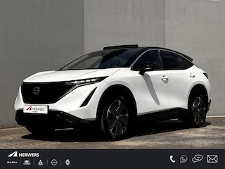 Nissan Ariya Evolve 91 kWh Dealer onderhouden / Accu SoH 99 % / Panorama schuifdak / HUD / Navigatie / Apple Carplay Android / Elektrische stoelen & klep / BOSE / Stoelventilatie / Stoel-, stuur- en achterbankverwarming / 20" LM wielen /