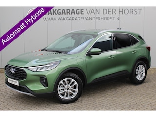 Ford Kuga 2.5-243pk PHEV Titanium. Hybride rijden voor een reëel bedrag. Slechts 11.500km ! Autm. airco dual, camera v+a, metallic lak, all season banden rondom, lane- en sideassist, adaptieve cruise control, winterpakket, navigatie, telefoonvoorb. etc
