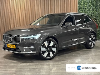 Volvo XC60 T8 AWD Recharge Ultra Bright | Luchtvering | Trekhaak | 360° Camera | 455pk | Head-Up Display | Adaptieve Cruise Control | Stoelverwarming voor+achter | Stuurwielverwarming | Schuifdak | Full LED Meesturende koplampen | Pilot Assist | BLIS Dode Hoek Detectie | Elektrische voorstoelen geheugen | Lederen bekleding | Zitting verlenging voorstoelen | Lederen dashboard | 20 Inch | Google Infotainment | Keyless Drive | Elektrisch bedienbare achterklep | DAB Radio | Apple Carplay/Android Auto | Alarm Klasse III | Draadloos telefoon opladen | Volvo On Call met mobiele App functie | Platinum Grey Metallic |