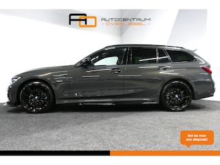 BMW 3-serie Touring 320e xDrive M Sport / M340i Diffuser / Black Diamond M Grille / M340i M Sport bumper pakket / Schuif-/kanteldak / Elektr. verstelbare voorstoelen (links met memory) / Stoelverwarming / Apple Carplay - Android Auto / Achteruitrijcamera / Ambienteverlichting / 19'' LMV / Shadow Line / Full LED / Adaptive Cruise Control