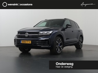 Volkswagen Touareg 3.0 TSi eHybrid 4MOTION R | HUD | Dyna Audio | Trekhaak | Nachtzicht | Stoelverwarming voor en achter | Panoramadak | Matrix LED | Luchtvering | Stoelmassage | Comfort-Pakket | SoftClose |